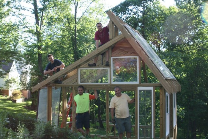 Chuck, Chaz (son), Josh & Brenden (son-in-laws) building greenhouse