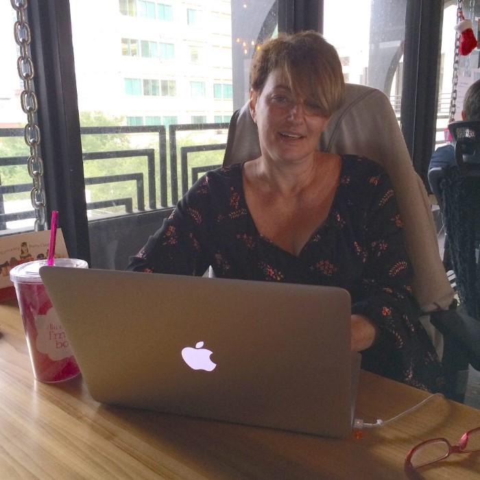Amy Koko with her laptop 