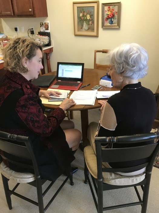 Susan St. Angelo working with a client